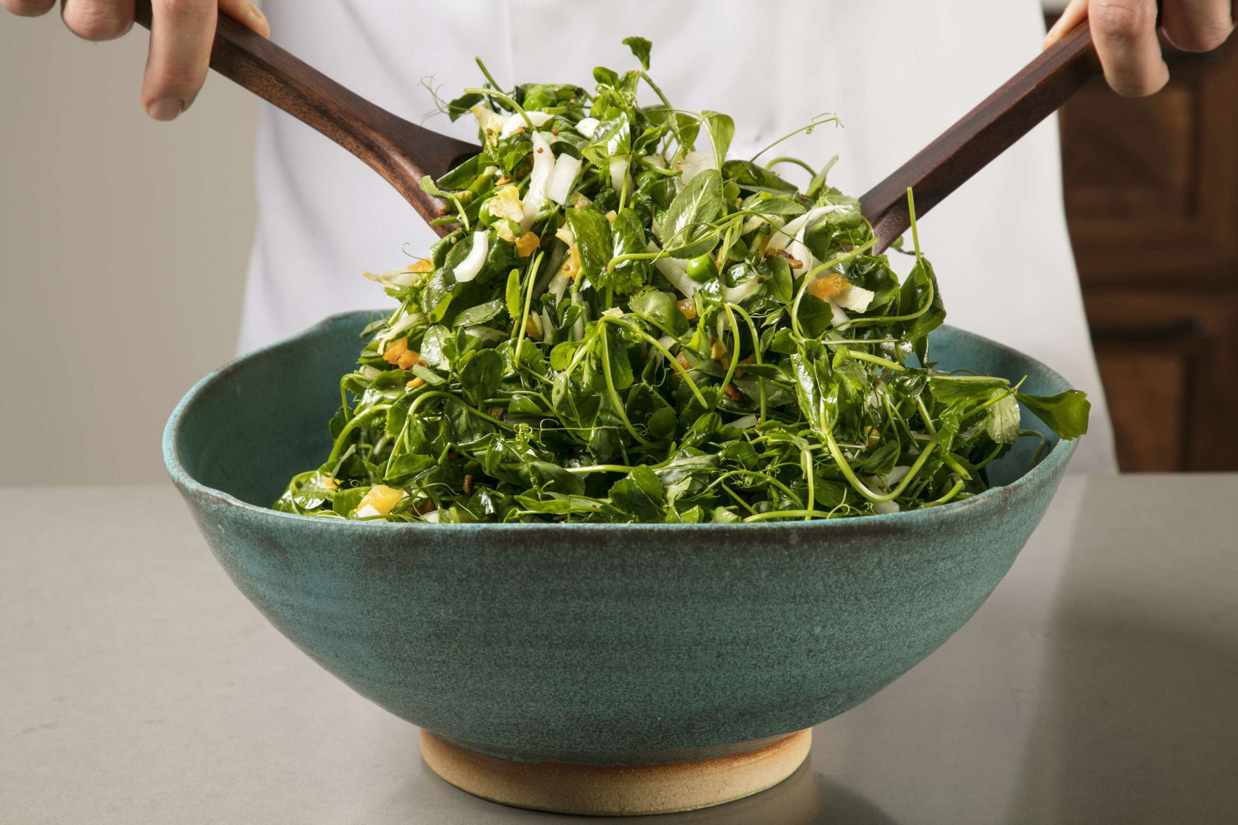 Food Column ATK Pea Green Salad with Warm Apricot Pistachio Vinaigrette